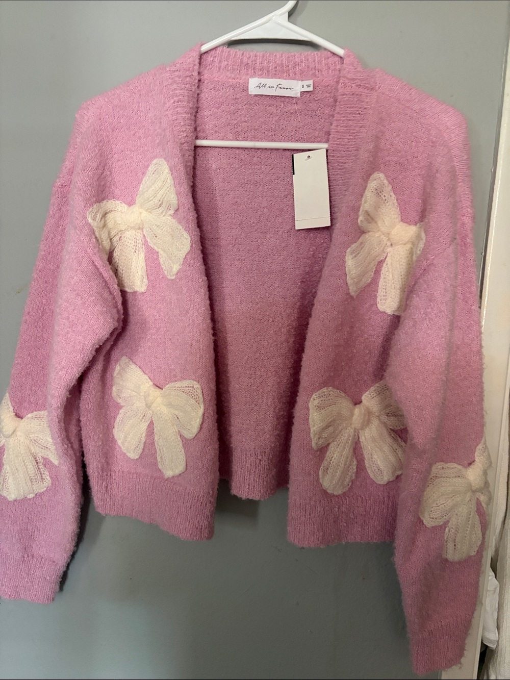 All in Favor Pink Open Cardigan with Cream Bow Appliqués